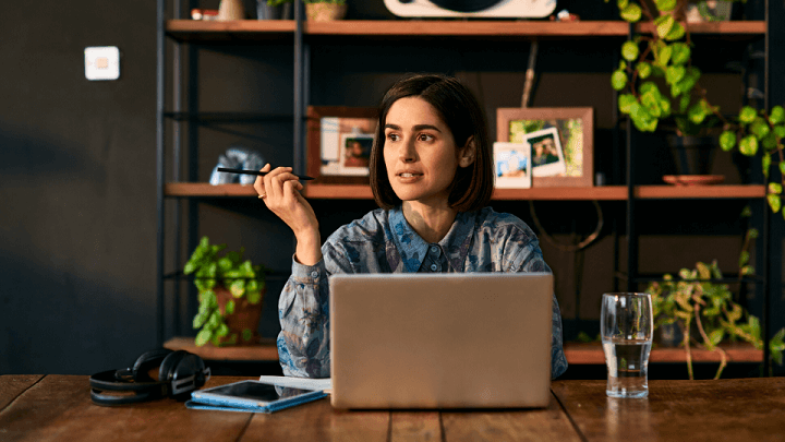 A woman at her computer while working from home